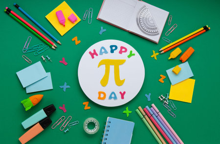 Happy World Pi Day concept. March 14th (3/14). Educational Pi Day flat lay with mathematical...