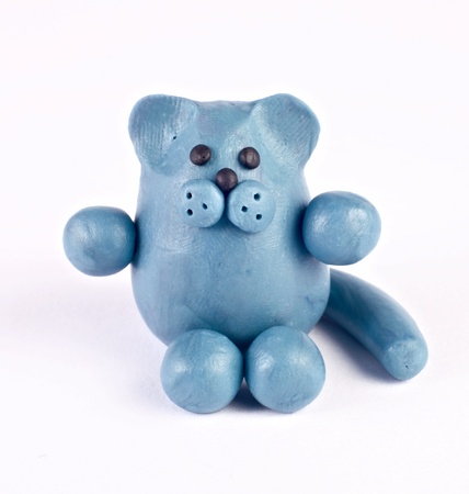 Plasticine cat isolated over whiteの写真素材