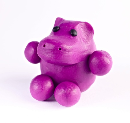 Plasticine hippopotamus isolated over whiteの写真素材