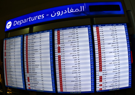 DUBAI AIRPORT, UAE - August 13: Departures timetable in Dubai airport, UAE on August 13, 2017のeditorial素材