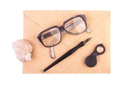 vintage letter, pen and glasses on a white background isolated.の写真素材