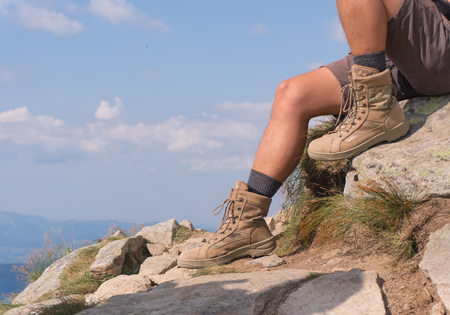 The guy in trekking boots. close-upの写真素材