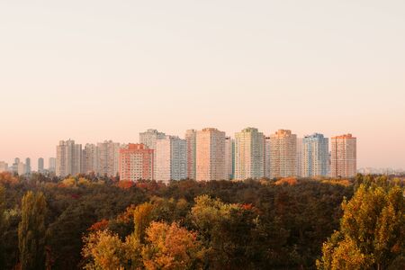 Complex of residential tall houses near the forest.の写真素材