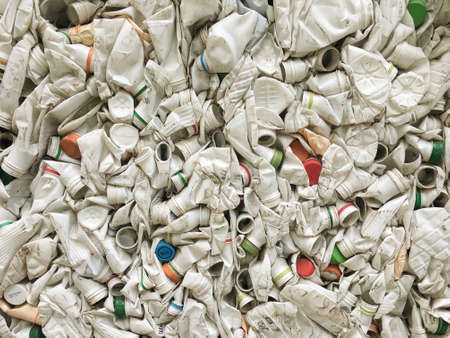 pressed plastic white bottles. waste. processing. ecology.の写真素材
