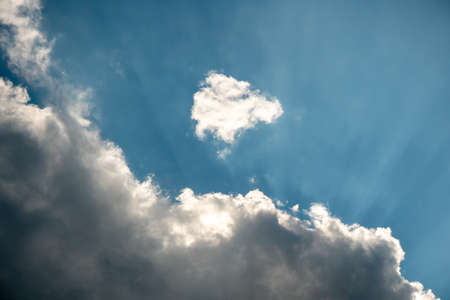 cloud with sun rays. with a place for credits.の写真素材