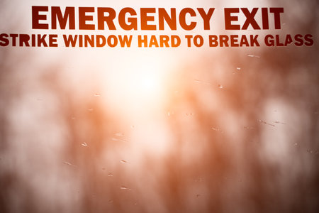 emergency window on train. emergency exit. close-up. inscription.