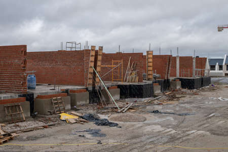 houses under construction. Brick walls on the sides. Horizontal backgroundの写真素材