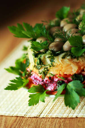 Potato lettuce with mushrooms, carrot and beetの写真素材