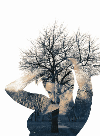 Double exposure. Collage of the woman and tree. Toningの写真素材