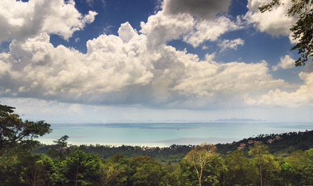 beautiful landscape with green forest valley, tropical island Koh Samui. calm sea and cloudy sky. Asia destination scenic. aerial view of Thailand islandsの写真素材