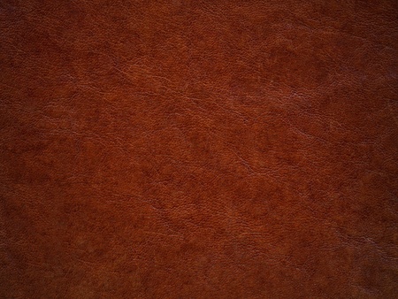 This is textured detail from an old leather case.の写真素材