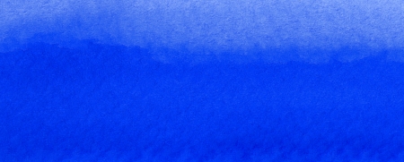 This blue watercolor wash is in panoramic dimensions.の写真素材