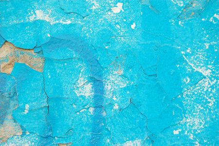 blue painted obsolete wall backgroundの写真素材