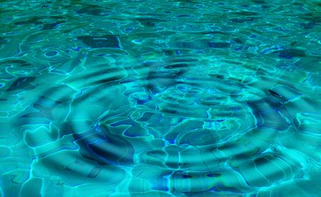 pattern of water of swimming pool with light in it