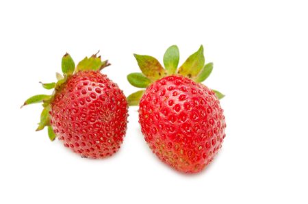 two strawberries isolated on white bgの写真素材