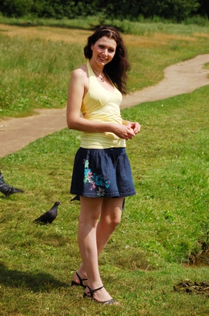 pretty brown-haired typical russian girl at windの写真素材