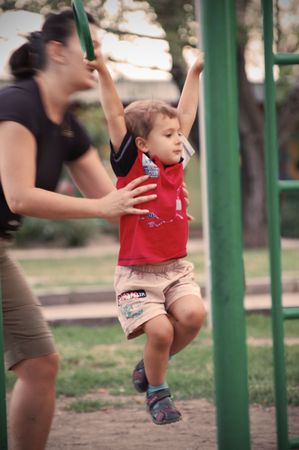 boy having exercise on play ground 