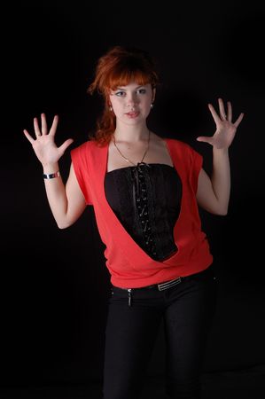 cute red-haired girl on blackの写真素材