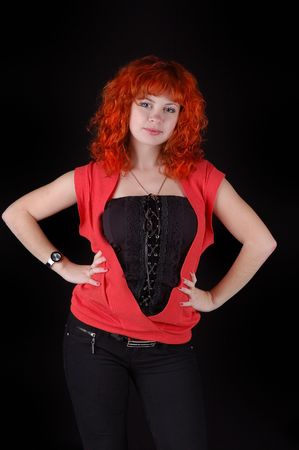cute red-haired girl on blackの写真素材