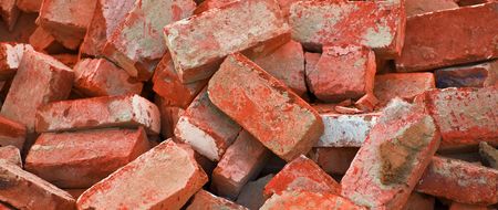 bg of heap of red bricksの写真素材