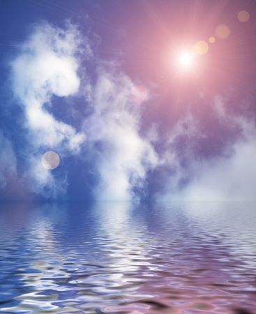 Sun in the sky covered with clouds and seaの写真素材