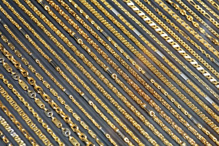 background of the solid gold chains in lines