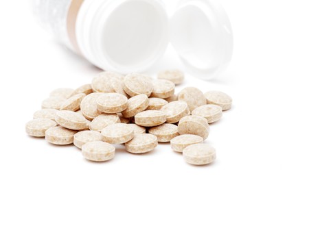 heap of pills isolated on the white backgroundの写真素材
