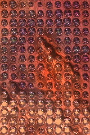 copper metal background cowered with dots