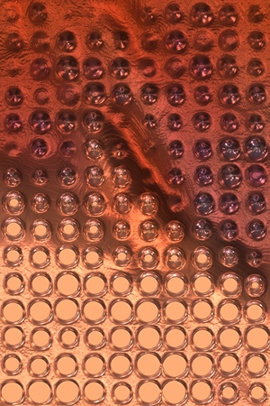 sparkles on a golden metal abstract background