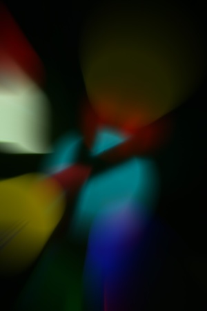 Color Bokeh  against a dark background for use at graphic design