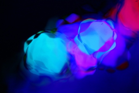 Decorative christmas background - defocused reflection of lights の写真素材