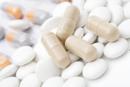 heap of pills isolated on the white background