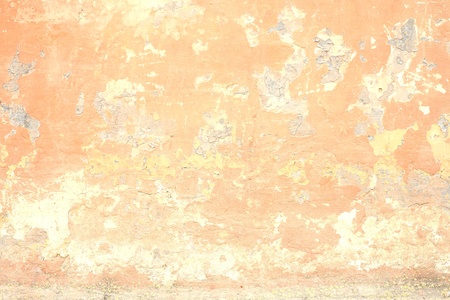 cracked grunge old painted wall backgroundの写真素材