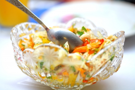 Healthy Salad with Shrimps on the plate and spoonの写真素材