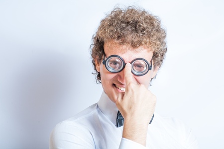 Funny young man in nerd glassesの写真素材