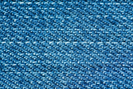 textured blue denim macro imageの写真素材