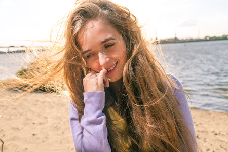 Long haired blonde outdoors very sexy