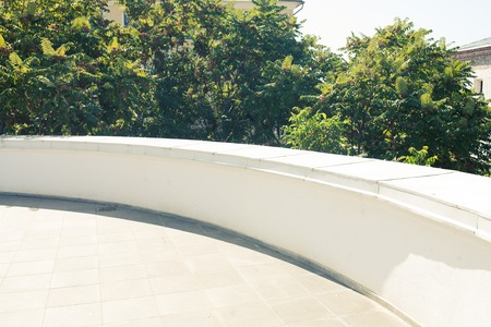 White wall and trees with copyspaceの写真素材