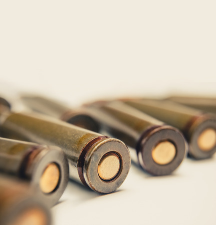 Ammo macro image. Back side of the AK-47 shells toned imageの写真素材
