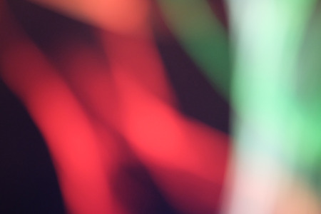 Red and green abstract blurred lights background.の写真素材