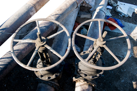 Two big valves outdoors.