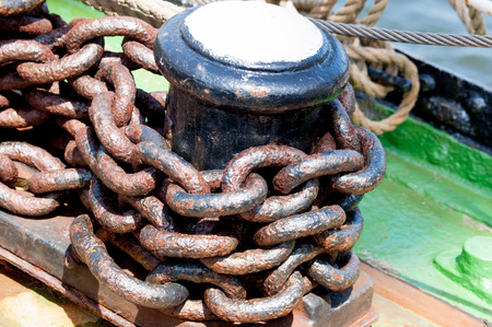 Rusty ship chain. Heavy rusted metal chain.