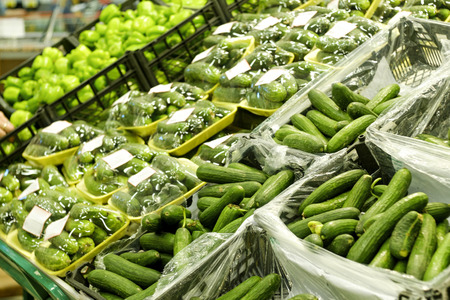 Green vegetables on the shelf in grocery store.の写真素材
