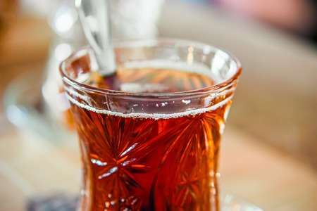 Turkish tea in traditional glass cup macro imageの写真素材