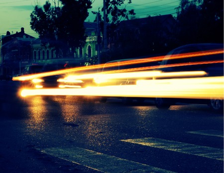 Trails of car lights toned image.の写真素材