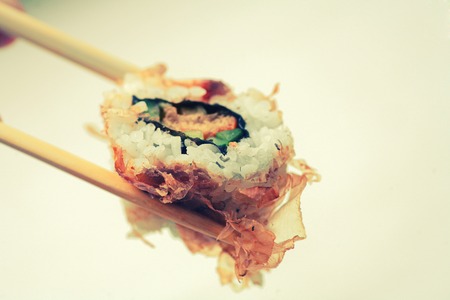 Sushi covered with dryed tuna with copy spaceの写真素材