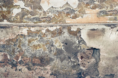 Grungy wall. Shabby construction toned image, colorized.の写真素材