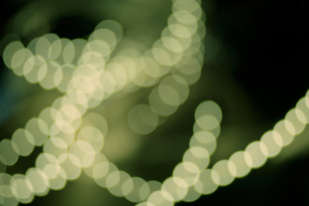 Vintage looking defocused holiday lights, blurred christmas decorations.の写真素材