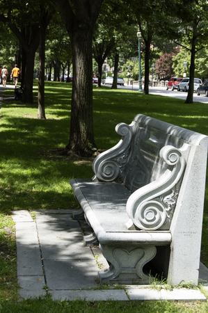Boston,Massachusetts, US, 27 Jul. 2009: A polished granite bench dedicated to Charles Pagelsen Howard is located on the Commonwealth Avenue Mall in the Back Bay section of Boston.のeditorial素材