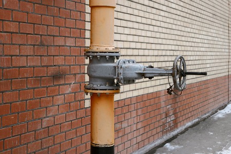 Gas energy system valve and pipe a lot of space for text vintage color-look